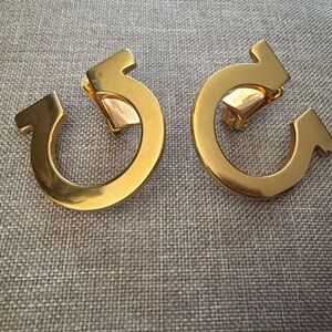 Salvatore Ferragamo Gancini Gold Tone Clip-On Earrings.